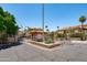 Community entrance boasts lush landscaping, a manned entry, and an inviting atmosphere at 10410 N Cave Creek Rd # 2229, Phoenix, AZ 85020