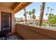 Relaxing patio area overlooking lush greenery and palm trees, perfect for outdoor enjoyment at 10410 N Cave Creek Rd # 2229, Phoenix, AZ 85020