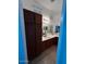 Spacious bathroom featuring a dual sink vanity and dark wood cabinets at 1350 S Greenfield Rd # 1219, Mesa, AZ 85206