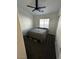 Cozy bedroom with a large window and neutral color scheme with ceiling fan at 1350 S Greenfield Rd # 1219, Mesa, AZ 85206