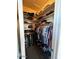 Walk-in closet with shelving and hanging racks, ideal for organization and storage at 1350 S Greenfield Rd # 1219, Mesa, AZ 85206