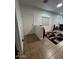 Bright entryway featuring tile floors, a staircase, and natural light from multiple windows at 1350 S Greenfield Rd # 1219, Mesa, AZ 85206