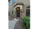Attractive front entrance with stone accents and covered entryway at 1350 S Greenfield Rd # 1219, Mesa, AZ 85206