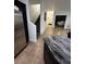 Modern interior with updated appliances, a kitchen island, and an open floor plan at 1350 S Greenfield Rd # 1219, Mesa, AZ 85206