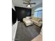Comfortable living room featuring a large sectional and accent wall at 1350 S Greenfield Rd # 1219, Mesa, AZ 85206