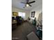 Home office with a desk, chair, and golf themed decor, creating an efficient workspace at 1350 S Greenfield Rd # 1219, Mesa, AZ 85206