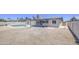 Backyard featuring a kidney-shaped pool, covered patio, and ample space, perfect for entertaining and outdoor activities at 14014 N 39Th Ave, Phoenix, AZ 85053