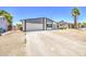 Charming single-story home featuring neutral paint, attached two-car garage, and a long driveway at 14014 N 39Th Ave, Phoenix, AZ 85053