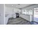 Modern kitchen boasts white cabinets, granite countertops, and stainless steel appliances at 14014 N 39Th Ave, Phoenix, AZ 85053