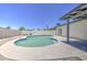 Inviting Kidney-shaped pool, surrounded by desert landscaping, offering a refreshing oasis in the backyard at 14014 N 39Th Ave, Phoenix, AZ 85053