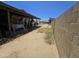 Spacious backyard with a covered patio, block wall, and ample room for outdoor activities at 14214 N 36Th Ave, Phoenix, AZ 85053