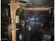 Cluttered garage with various tools and equipment, offering potential for a workshop or storage space at 14214 N 36Th Ave, Phoenix, AZ 85053