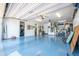 This spacious garage features ample storage space, a work area, and epoxy flooring at 15953 W Catalina Dr, Goodyear, AZ 85395