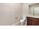 Powder room featuring a dark vanity and tile flooring at 2000 N 36Th St # 30, Phoenix, AZ 85008