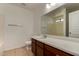 Bathroom showcasing a vanity, sink, toilet, and a bath/shower combo at 23682 W Bowker St, Buckeye, AZ 85326
