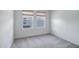 Serene bedroom featuring carpet flooring and bright windows, perfect for a restful and inviting atmosphere at 240 W Missouri Ave # 1, Phoenix, AZ 85013