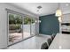 Bright dining area with modern pendant lighting and access to outdoor seating area at 240 W Missouri Ave # 1, Phoenix, AZ 85013