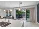 Modern kitchen with stainless sink, sleek countertops, and access to outdoor patio at 240 W Missouri Ave # 1, Phoenix, AZ 85013