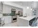 Modern kitchen with stainless appliances, gas range, island and open layout, perfect for entertaining at 240 W Missouri Ave # 1, Phoenix, AZ 85013
