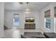Bright living room featuring modern chandelier, decorative console, and a relaxing atmosphere at 240 W Missouri Ave # 1, Phoenix, AZ 85013