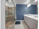 Modern main bathroom with dual sinks, and an updated shower at 240 W Missouri Ave # 1, Phoenix, AZ 85013
