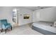Serene main bedroom featuring comfortable seating and an en-suite bathroom at 240 W Missouri Ave # 1, Phoenix, AZ 85013
