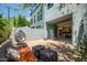 This cozy brick patio features comfortable seating and seamlessly connects indoor-outdoor living at 240 W Missouri Ave # 1, Phoenix, AZ 85013