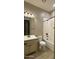 Bathroom features a vanity sink, toilet and bathtub-shower combo with tile flooring at 2811 S Jeffry St, Gilbert, AZ 85295