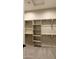 Spacious walk-in closet with custom shelves and hanging racks at 2811 S Jeffry St, Gilbert, AZ 85295