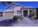 Charming single-story home featuring desert landscaping, a neutral color palette, and a covered front porch at 2811 S Jeffry St, Gilbert, AZ 85295