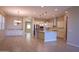 Open concept kitchen and dining area featuring granite countertops and stainless steel appliances at 2811 S Jeffry St, Gilbert, AZ 85295
