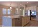 Kitchen featuring a large island with granite countertops, white cabinetry, and stainless steel appliances at 2811 S Jeffry St, Gilbert, AZ 85295