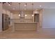 Bright kitchen features granite countertops, pendant lighting, and stainless steel appliances at 2811 S Jeffry St, Gilbert, AZ 85295