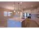 Spacious kitchen features a large granite island with stainless steel appliances at 2811 S Jeffry St, Gilbert, AZ 85295