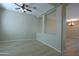 Living room with a ceiling fan and lots of open space at 2811 S Jeffry St, Gilbert, AZ 85295