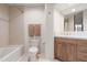 Bright bathroom featuring tile flooring, tile shower and sink with vanity at 39089 N 102Nd Way, Scottsdale, AZ 85262