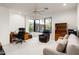 Home office with lots of light, neutral colors and comfortable seating at 39089 N 102Nd Way, Scottsdale, AZ 85262