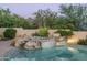 Inviting hot tub and pool set amongst lush vegetation, creating a private retreat at 39089 N 102Nd Way, Scottsdale, AZ 85262