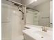 Bathroom with dual shower head and glass door at 408 W Sweet Shrub Ave, San Tan Valley, AZ 85140