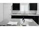 The kitchenette has dark cabinets and gray granite countertops at 42087 W Manderas Ln, Maricopa, AZ 85138