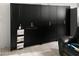 Spacious storage cabinets offer ample room for organization, complemented by neutral tile flooring at 42087 W Manderas Ln, Maricopa, AZ 85138