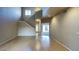 Bright living room with vaulted ceiling, hardwood floors and staircase at 4776 W Eva St, Glendale, AZ 85302