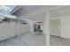 The covered patio features a sliding glass door, security door and privacy walls at 4776 W Eva St, Glendale, AZ 85302