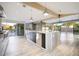 Bright, open kitchen with modern island, stainless appliances and access to outdoor space at 6529 N Mountain View Dr, Paradise Valley, AZ 85253