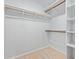 Walk-in closet with shelves, and hanging rails for storage at 10807 W Morten Ave, Glendale, AZ 85307