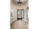 Grand foyer featuring decorative tile flooring and elegant wrought iron door at 11070 E Bent Tree Dr, Scottsdale, AZ 85262