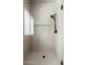 Modern walk-in shower features sleek tile work, glass enclosure, and high-end fixtures at 11070 E Bent Tree Dr, Scottsdale, AZ 85262