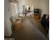 Bedroom with closet, carpet and wicker chairs at 11210 W Alvarado Rd, Avondale, AZ 85392