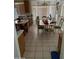 Bright kitchen with breakfast nook and tile flooring at 11210 W Alvarado Rd, Avondale, AZ 85392