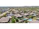 Real estate showcasing a backyard pool, green space, and lush trees in a well-developed community at 12710 W Forest Pleasant Pl, Peoria, AZ 85383